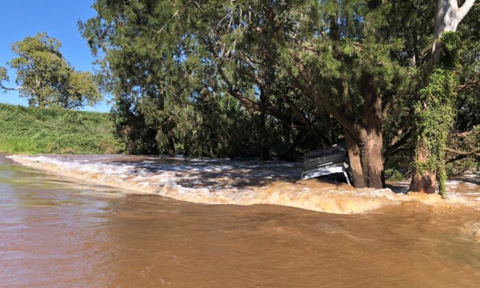 A ute submerged in floodwaters in Queensland, Australia, Nov. 25, 2021. (Supplied by Queensland Fire and Emergency Services) 