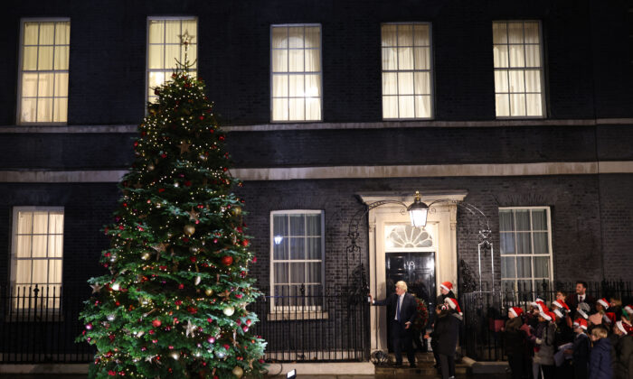 British Prime Minister Boris Johnson hosts an event to light up the Christmas tree on Downing Street on Dec. 1, 2021. (Dan Kitwood/Getty Images)