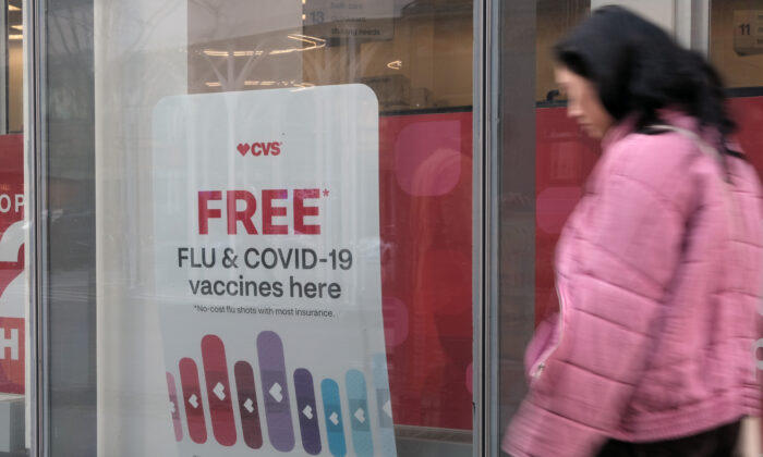 A sign at a drug store advertises the COVID-19 vaccine on November 19, 2021 in New York City. (Spencer Platt/Getty Images)