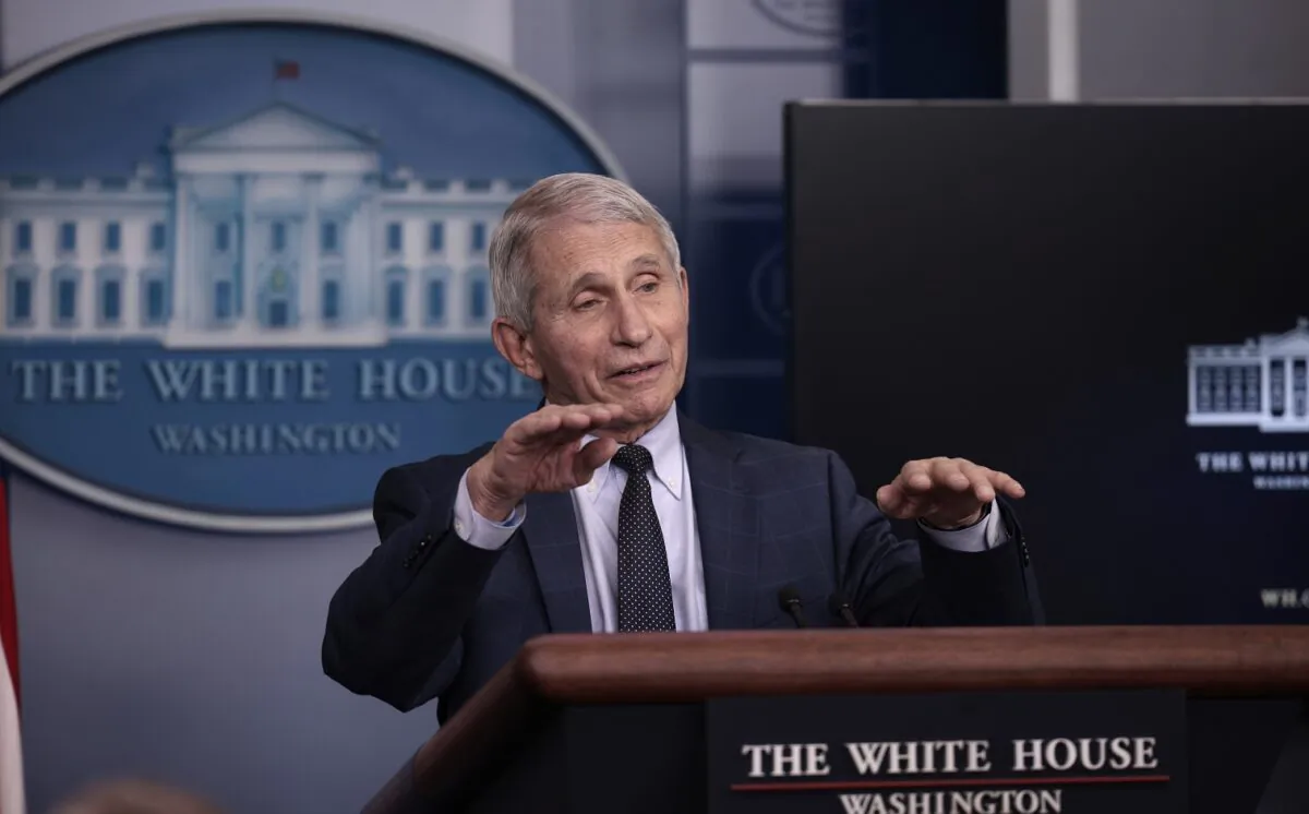 Dr. Anthony Fauci, director of the National Institute of Allergy and Infectious Diseases and the chief medical adviser to the president, gestures as he answers a question from a reporter after giving an update on the Omicron COVID-19 variant during the daily press briefing at the White House in Washington on Dec. 1, 2021. (Anna Moneymaker/Getty Images)