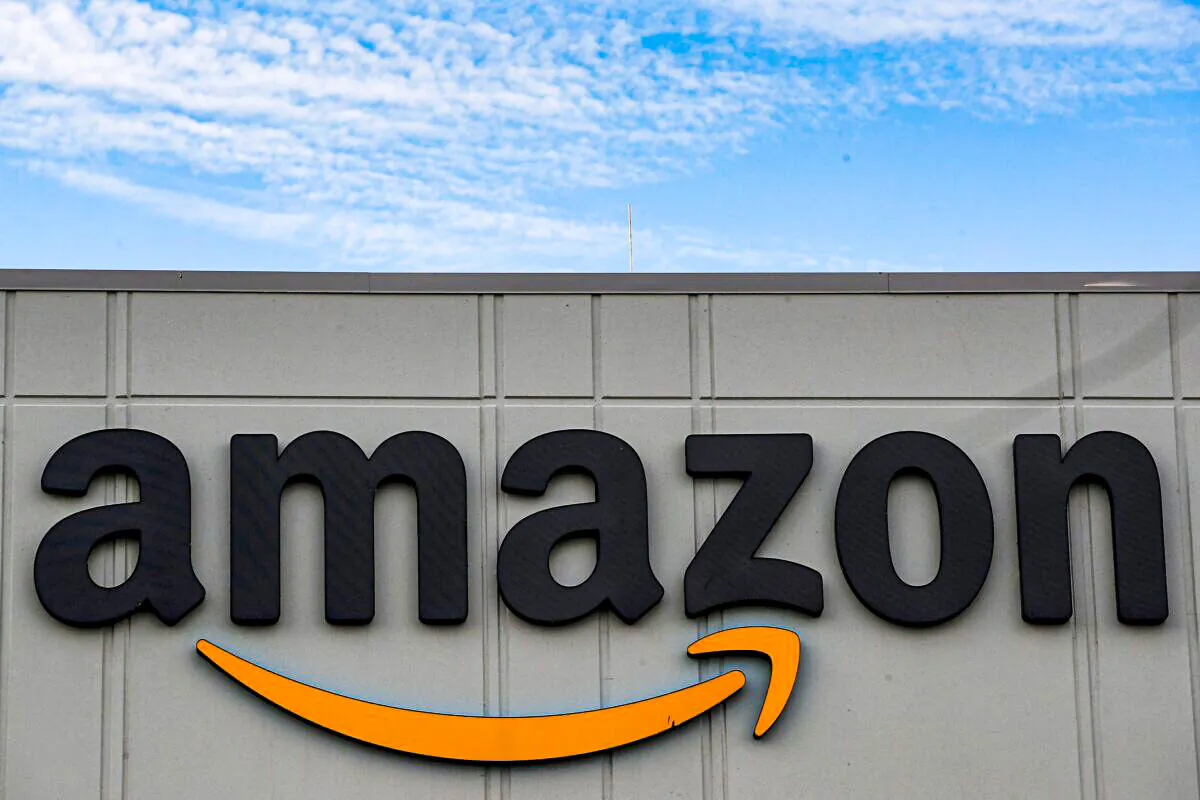 The Amazon logo is seen outside its JFK8 distribution center in Staten Island, N.Y., on Nov. 25, 2020. (Brendan McDermid/Reuters)