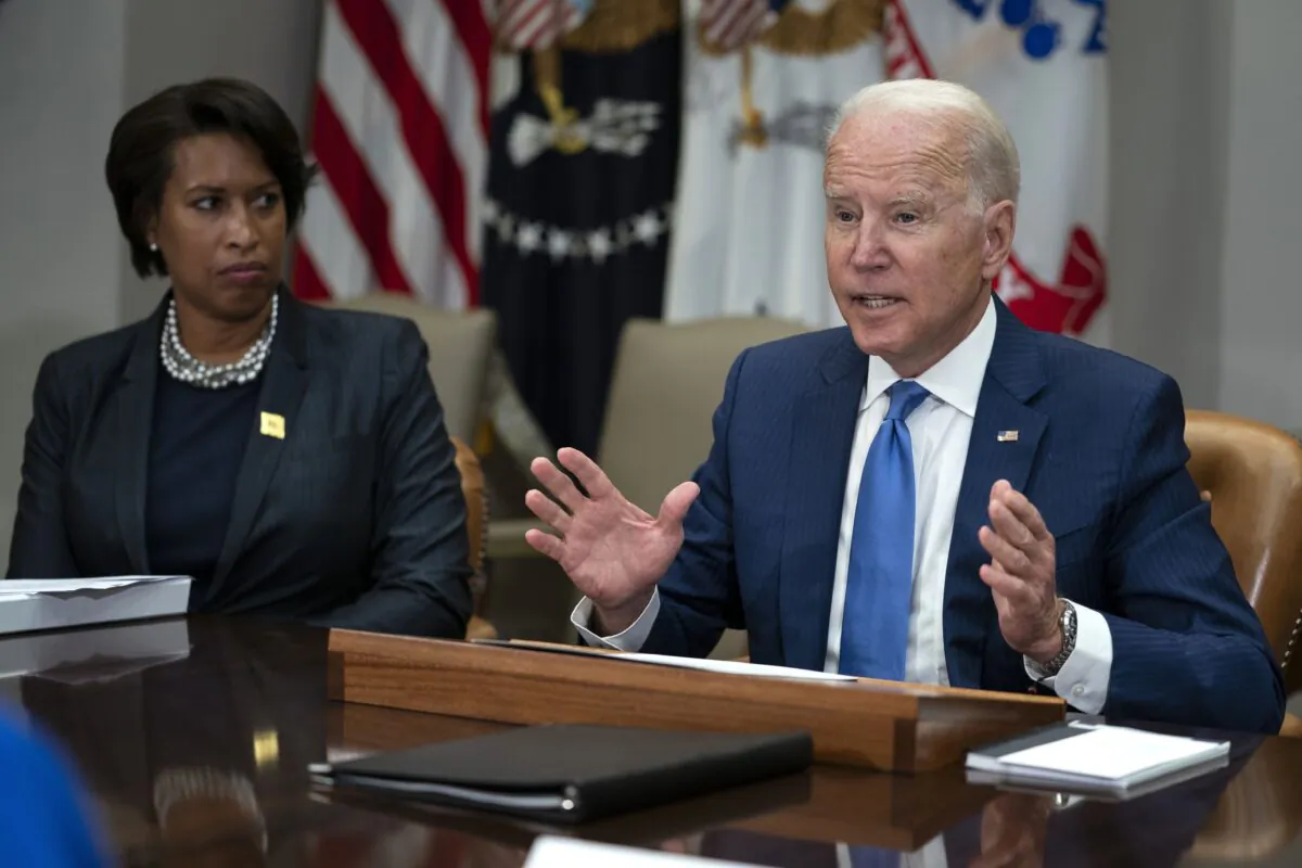 Washington Mayor Muriel Bowser listens as President Joe Biden speaks in the Roosevelt Room of the White House in Washington on July 12, 2021. (AP Photo/Evan Vucci)