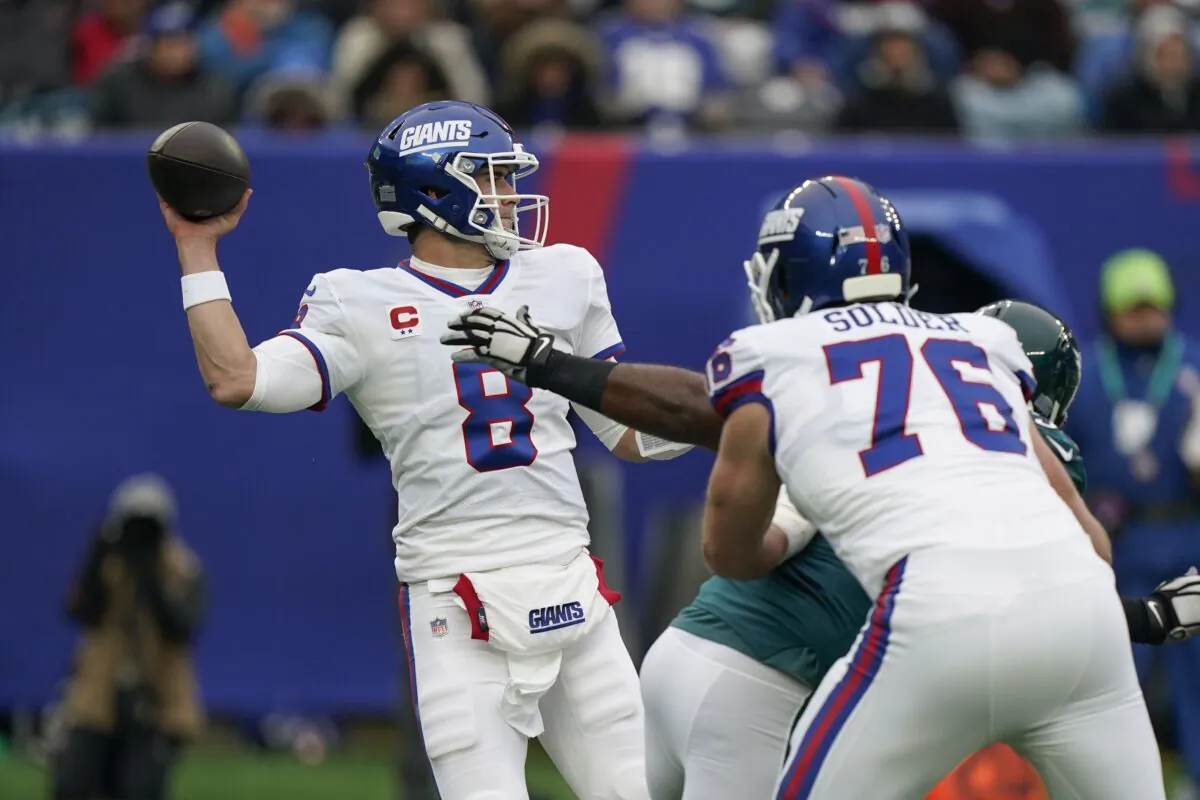New York Giants quarterback Daniel Jones throws under pressure during the first half of an NFL football game against the Philadelphia Eagles, in East Rutherford, N.J., on Nov. 28, 2021. (Corey Sipkin/AP Photo)