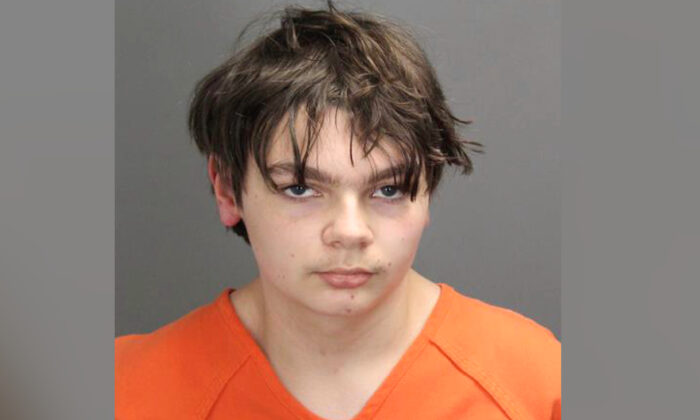 Ethan Crumbley, 15, who is charged as an adult with murder and terrorism for a shooting that killed four fellow students and injured more at Oxford High School in Oxford, Mich., is seen in a file mugshot. (Oakland County Sheriff's Office via AP)