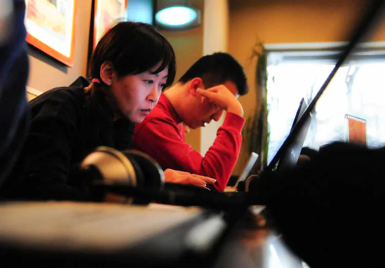 According to the 2007 Annual Report on China's Internet Network, the struggle for free online access by everyday Chinese Internet users is getting more desperate as the Chinese Communist regime has stepped up on its control on the Internet. (Frederic J. Brown/AFP/Getty Images)