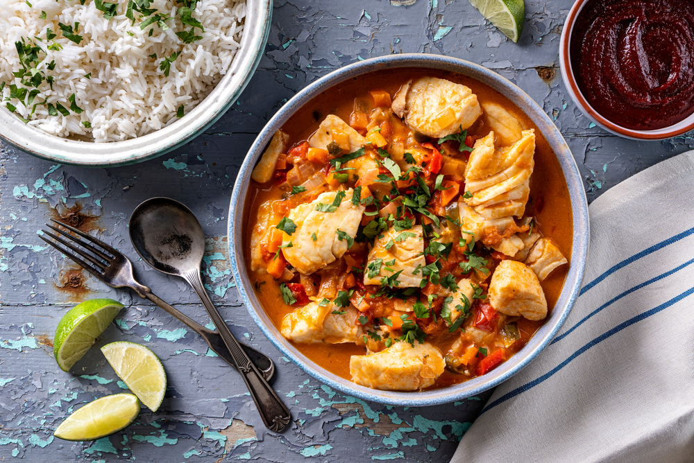 Moqueca Capixaba, from the Brazilian state of Espírito Santo, gets its distinct flavor from the combination of cilantro, bell peppers, and almost-burnt garlic. (Foodio/Shutterstock)