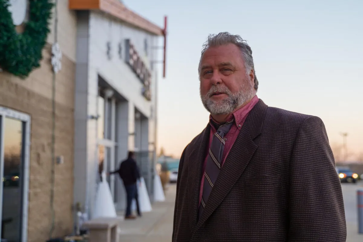 James Sparks stands in front of Brooklife Church in Mukwonago, Wis., on Dec. 2, 2021. (Cara Ding/The Epoch Times)