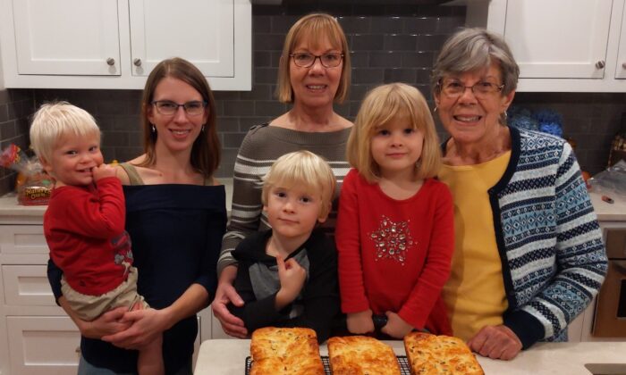  author (center) with her mother, Bobbie Kribs; daughter, Sarah Smith; and grandchildren Blaise, Niko, and Ella with freshly baked loaves of Siste Kage. (Courtesy of Doris Richardson)