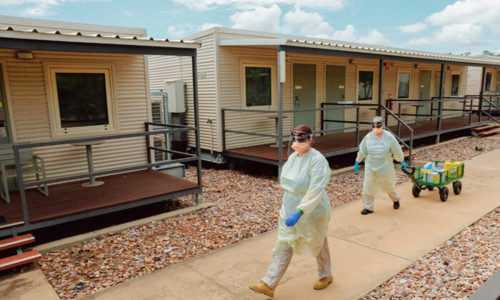 Staff conduct a Swabbing run at a PPE drill at the NCCTRCA/AUSMAT sections of the Howard Springs quarantine facility, Darwin, Australia on January 14, 2021. (AAP Image/Glenn Campbell)