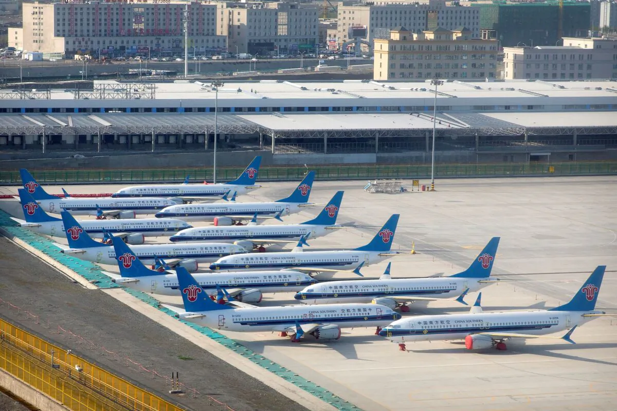 China Southern Airlines Boeing 737 Max airplanes are parked at the edge of the tarmac at Urumqi Diwopu International Airport in Urumqi, in western China's Xinjiang Uyghur Autonomous Region, on April 21, 2021. (Mark Schiefelbein/AP Photo)