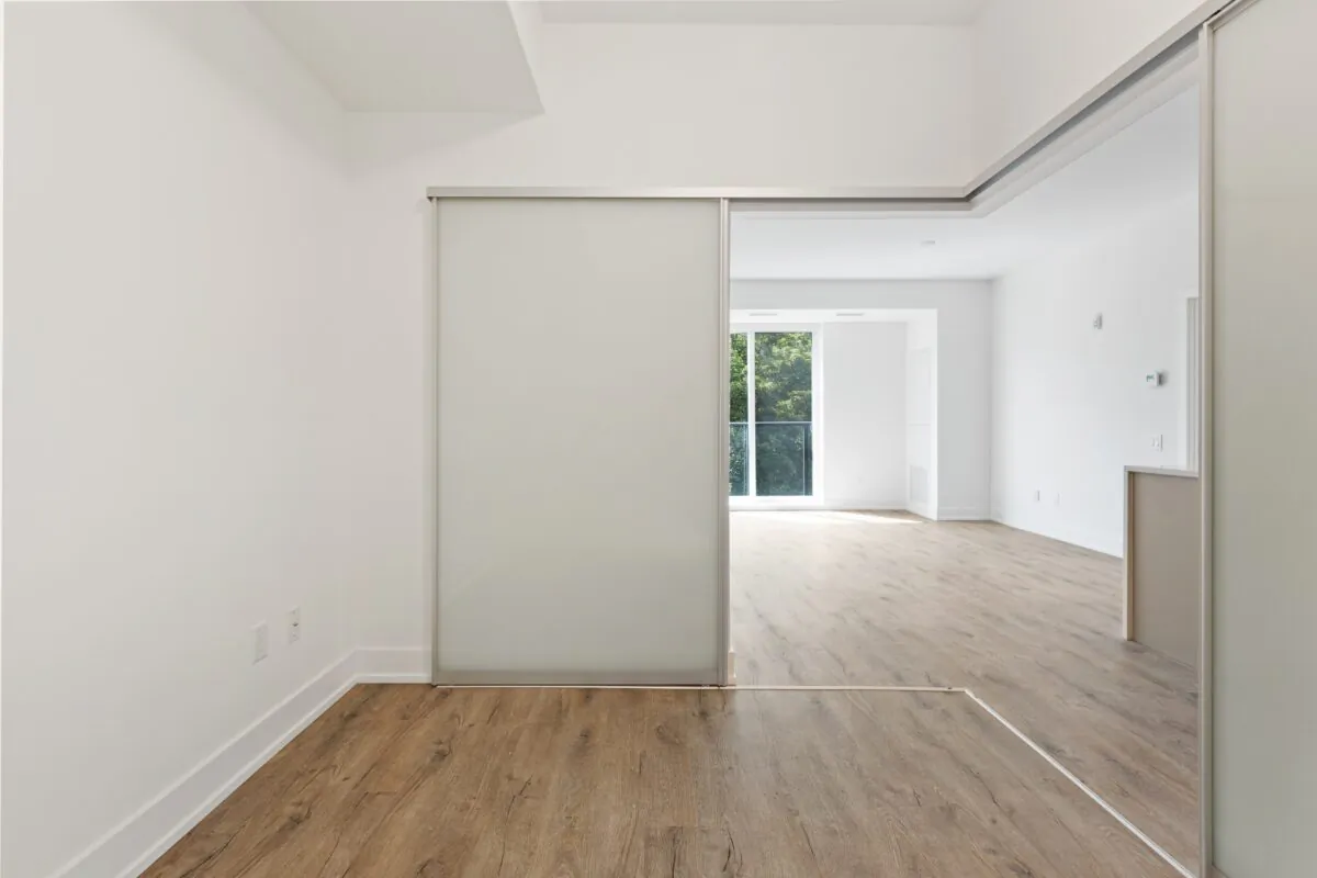 Depending upon how much privacy and quiet you actually need, dividing the room with folding screens can be very attractive, relatively inexpensive, and quick to install. If you need more, consider a partition wall. (Unsplash)