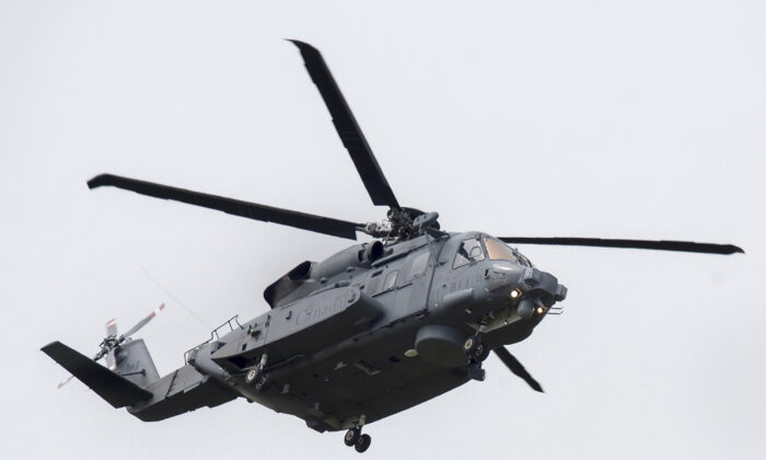 CH-148 Cyclone Helicopter at 12 Wing Shearwater, home of the 423 Maritime Helicopter Squadron, flying near the base of Eastern Passage, Nova Scotia, June 23, 2020.  (Canadian Press / Andrew Vaughn)