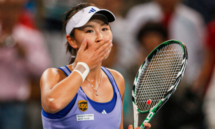 Chinese tennis player Peng Shuai reacts during a tennis match in Beijing, China, on Oct. 6, 2009. (AP Photo/Ng Han Guan)

