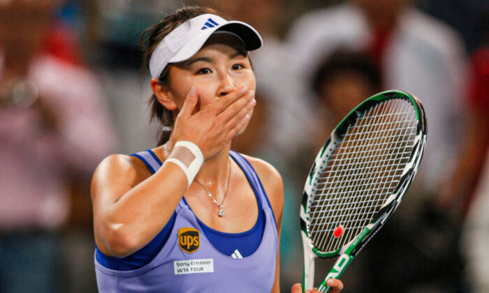 Chinese tennis player Peng Shuai reacts during a tennis match in Beijing, China, on Oct. 6, 2009. (AP Photo/Ng Han Guan)

