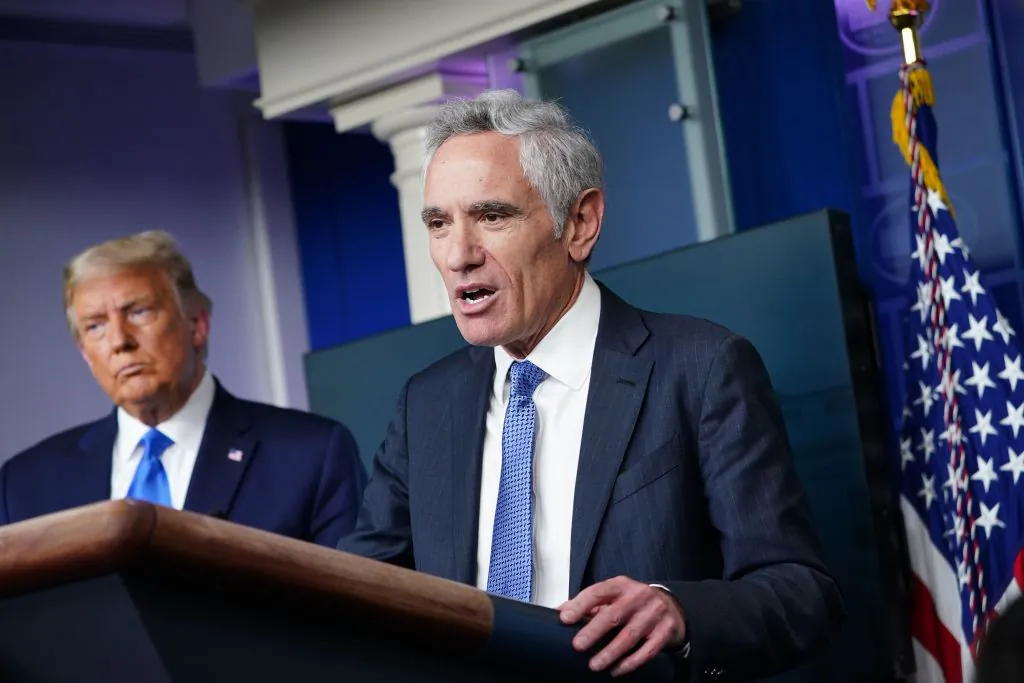 President Donald Trump (L) listens to White House coronavirus adviser Dr. Scott Atlas speak during a press conference in the Brady Briefing Room of the White House in Washington on Sept. 23, 2020. (Mandel Ngan/AFP via Getty Images)