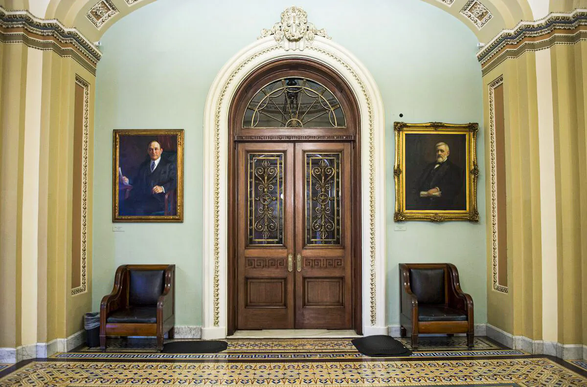The closed doors to the Senate Chamber on Capitol Hill in Washington, D.C., on Oct. 14, 2013. (Jim Watson/AFP/Getty Images)