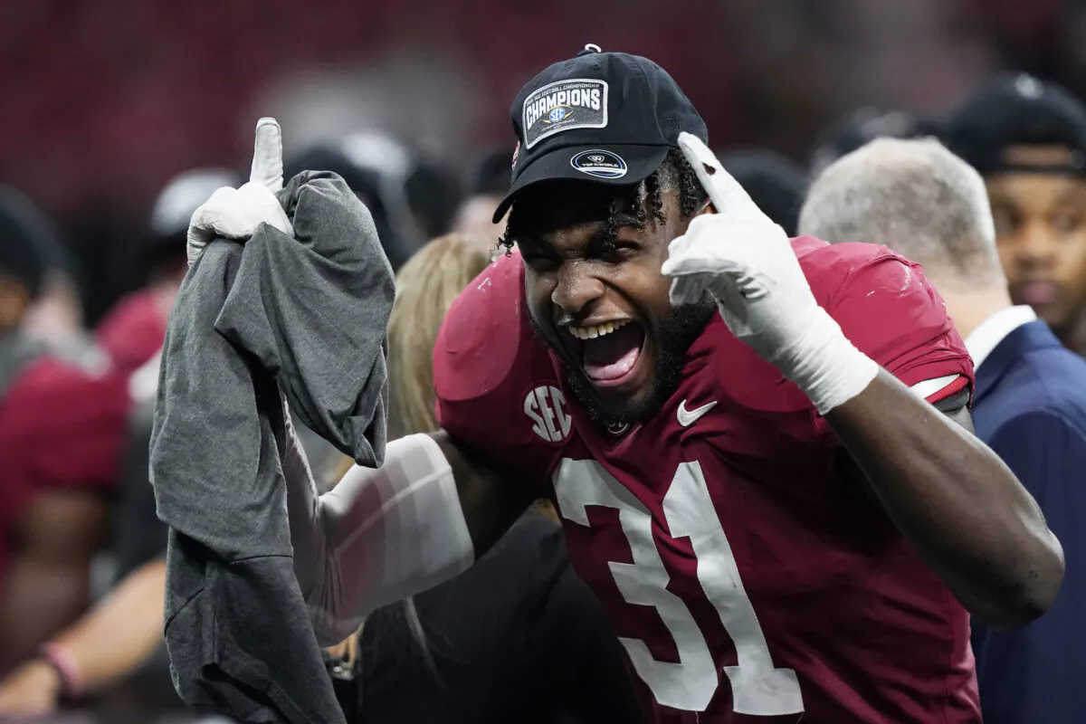 Alabama wide receiver Shatarius Williams (31) celebrates the team's win after the Southeastern Conference championship NCAA college football game between Georgia and Alabama in Atlanta, on Dec. 4, 2021. (Brynn Anderson/AP Photo)