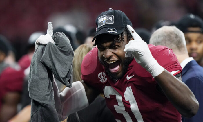 Alabama wide receiver Shatarius Williams (31) celebrates the team's win after the Southeastern Conference championship NCAA college football game between Georgia and Alabama in Atlanta, on Dec. 4, 2021. (Brynn Anderson/AP Photo)