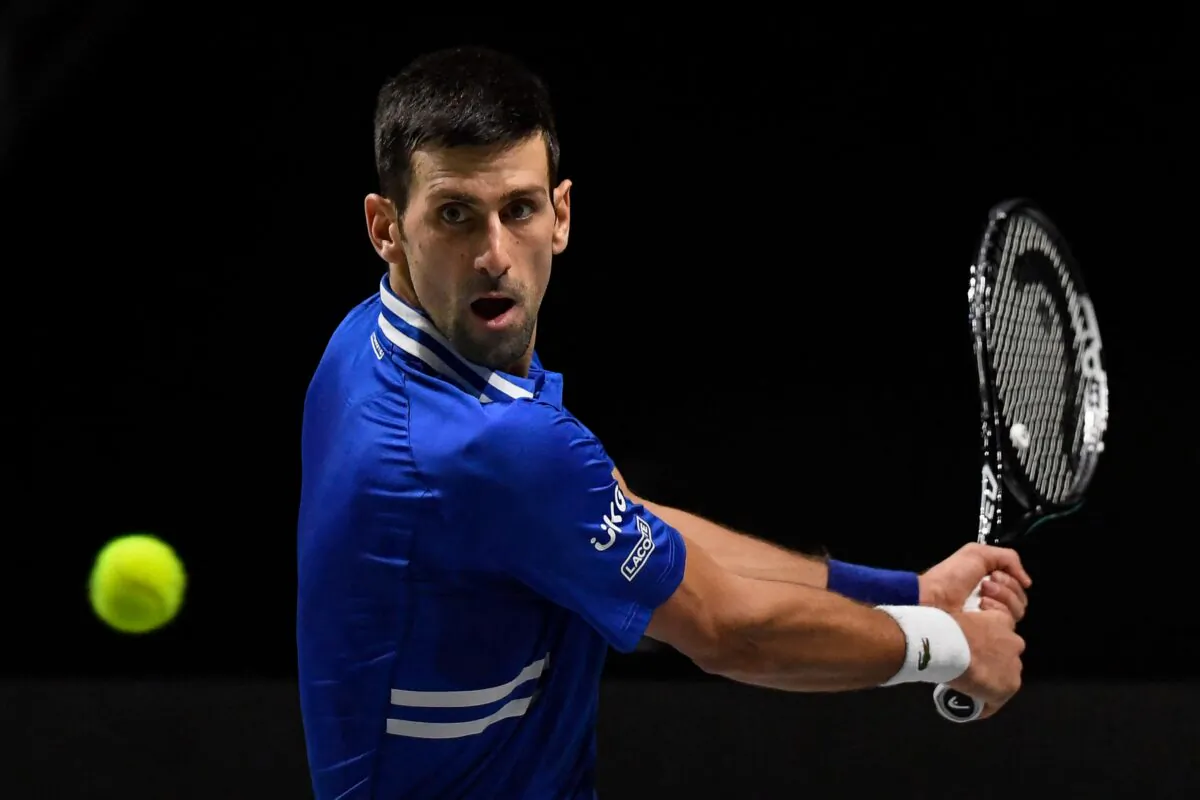 Serbia's Novak Djokovic returns the ball during the men's singles semifinal tennis match between Croatia and Serbia of the Davis Cup tennis tournament at the Madrid arena in Madrid, Spain, on Dec. 3, 2021. (Oscar Del Pozo/AFP via Getty Images)
