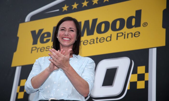 Alabama Republican Senate candidate and honorary starter, Katie Britt is introduced on stage during pre-race ceremonies prior to the NASCAR Cup Series YellaWood 500 at Talladega Superspeedway in Alabama on Oct. 3, 2021. (Sean Gardner/Getty Images)
