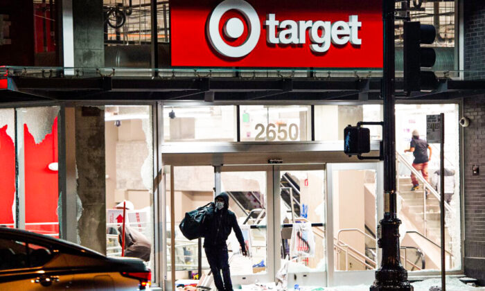 A looter robs a Target store in Oakland, Calif., in a May 30, 2020, file photograph. (Josh Edelson/AFP via Getty Images)
