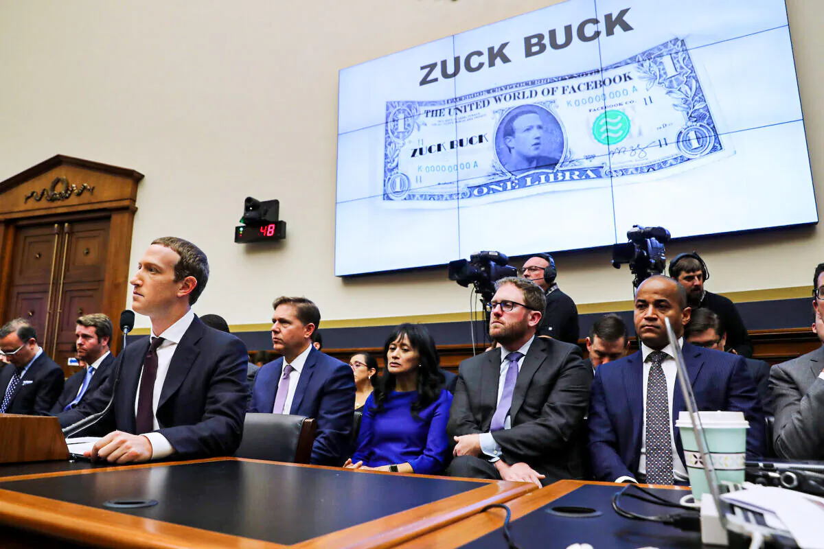 Facebook co-founder and CEO Mark Zuckerberg (L) testifies before the House Financial Services Committee in the Rayburn House Office Building on Capitol Hill October 23, 2019 in Washington, DC. Zuckerberg testified about Facebook's proposed cryptocurrency Libra, how his company will handle false and misleading information by political leaders during the 2020 campaign and how it handles its users' data and privacy. (Chip Somodevilla/Getty Images)