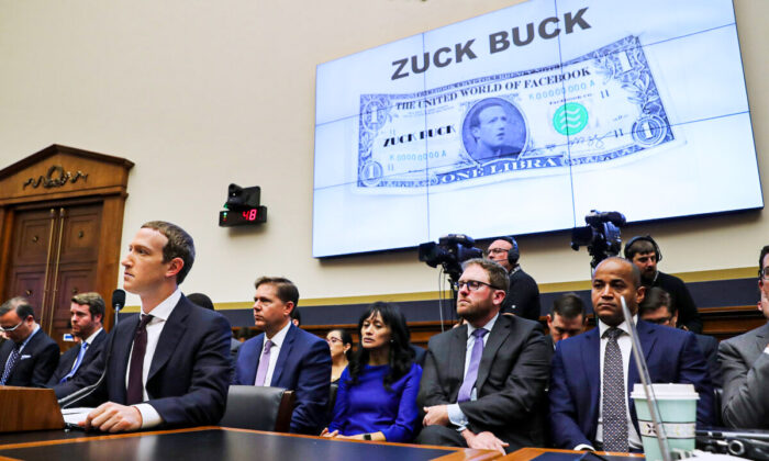 Facebook co-founder and CEO Mark Zuckerberg (L) testifies before the House Financial Services Committee in the Rayburn House Office Building on Capitol Hill October 23, 2019 in Washington, DC. Zuckerberg testified about Facebook's proposed cryptocurrency Libra, how his company will handle false and misleading information by political leaders during the 2020 campaign and how it handles its users' data and privacy. (Chip Somodevilla/Getty Images)