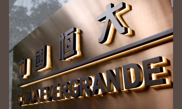 The China Evergrande Centre building sign is seen in Hong Kong, on Sept. 23, 2021. (Tyrone Siu/Reuters)