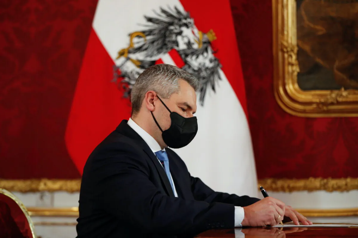 Designated Chancellor and leader of the People's Party (OVP) Karl Nehammer attends the swearing-in ceremony of a new government at Hofburg Palace in Vienna, on Dec. 6, 2021. (Leonhard Foeger/Reuters)