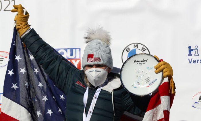 Gold Medal winner, Kaillie Humphries of the United States celebrates on the podium after winning the Women’s Monobob at the IBSF World Championships 2021 Altenberg competition at Eiskanal Altenberg on Feb. 14, 2021 in Altenberg, Germany. (Martin Rose/Getty Images)