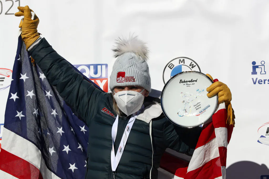 Gold Medal winner, Kaillie Humphries of the United States celebrates on the podium after winning the Women’s Monobob at the IBSF World Championships 2021 Altenberg competition at Eiskanal Altenberg on Feb. 14, 2021 in Altenberg, Germany. (Martin Rose/Getty Images)