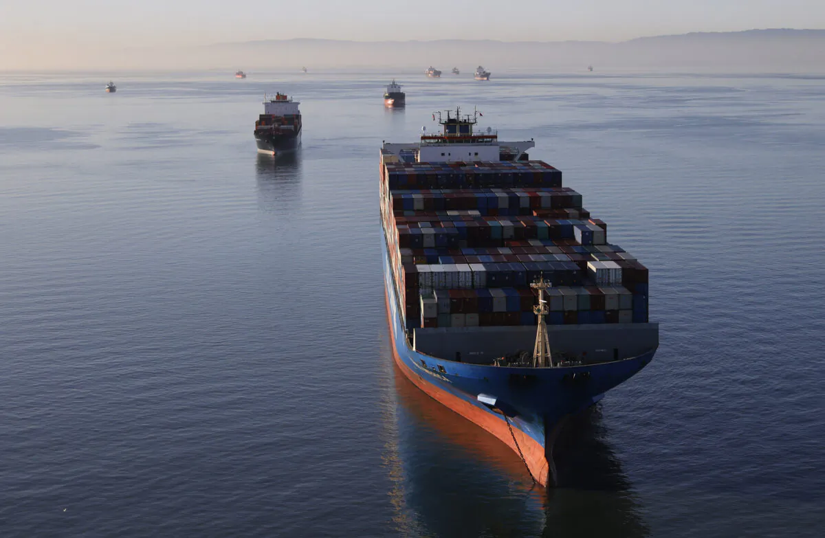 Container ships sit idle in the the San Francisco Bay just outside of the Port of Oakland on March 26, 2021. (Justin Sullivan/Getty Images)