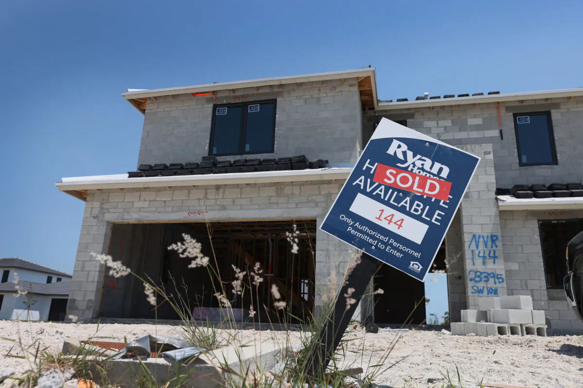 A sold sign in front of a new home being built in Miami, Fla., on April 16, 2021. The U.S. Census Bureau and the U.S. Department of Housing and Urban Development jointly announced that housing starts surged 19.4% in March to their highest level since 2006. (Joe Raedle/Getty Images)