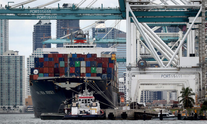 A cargo ship is offloaded at Port Miami, Fla., on Nov. 4, 2021. (Joe Raedle/Getty Images)
