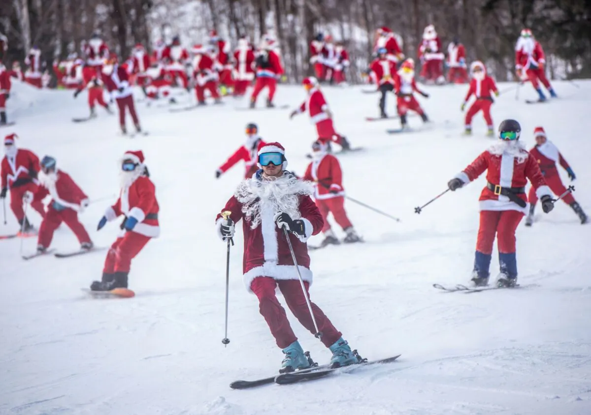 Skiers and snowboarders hit the slopes at Sunday River Ski Resort in Newry, Maine, on Dec. 5, 2021. (Andree Kehn/Sun Journal via AP)