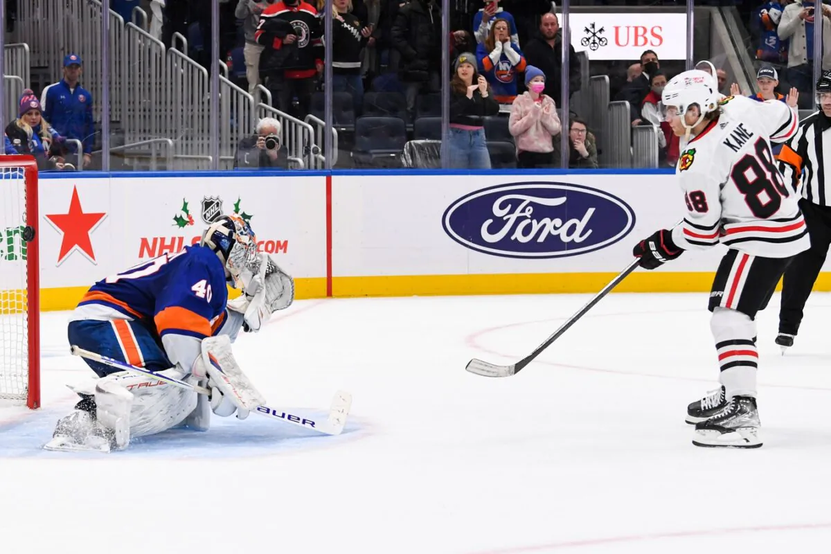 Chicago Blackhawks right wing Patrick Kane (88) scores the winning goal on New York Islanders goaltender Semyon Varlamov (40) during shootouts at UBS Arena in Elmont, N.Y., on Dec 5, 2021. (Dennis Schneidler/USA TODAY Sports via Field Level Media)