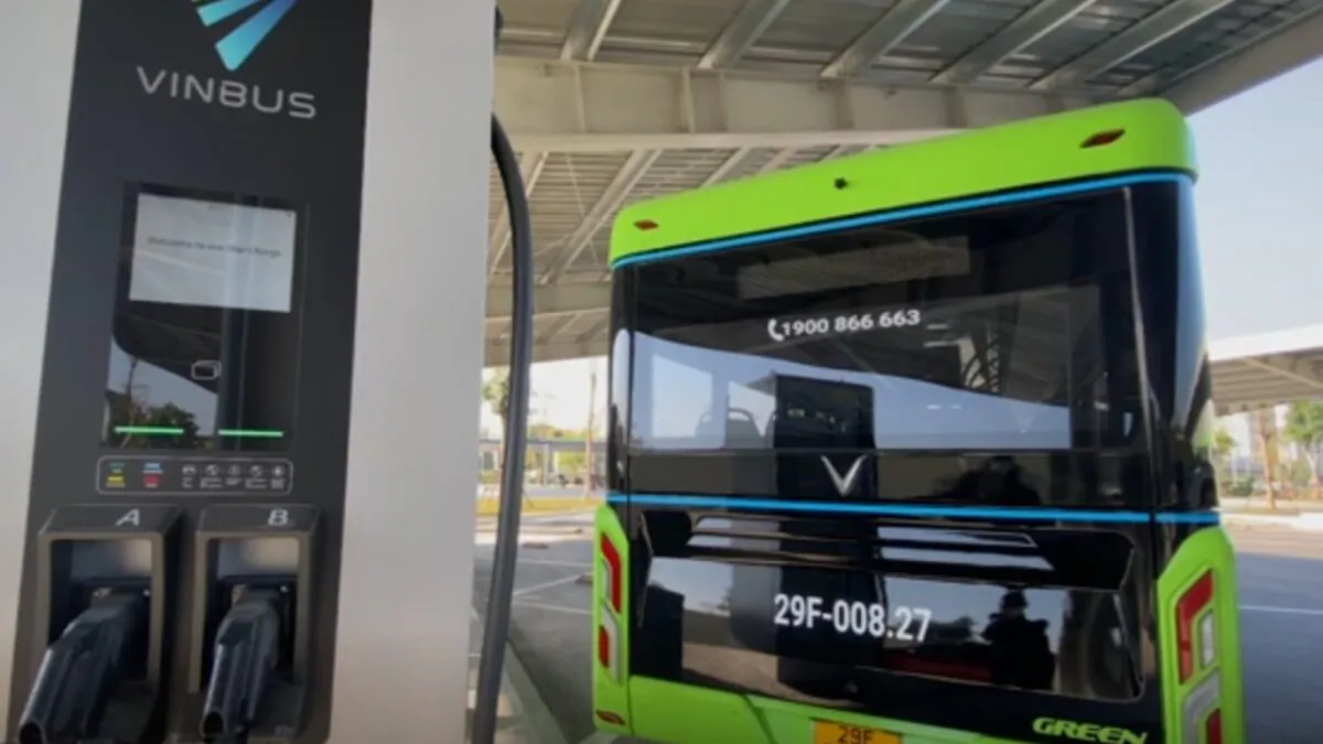 An electric bus parks next to a charging post in Hanoi, Vietnam, on Dec. 2, 2021, in a still from video. (AP/Screenshot via The Epoch Times)