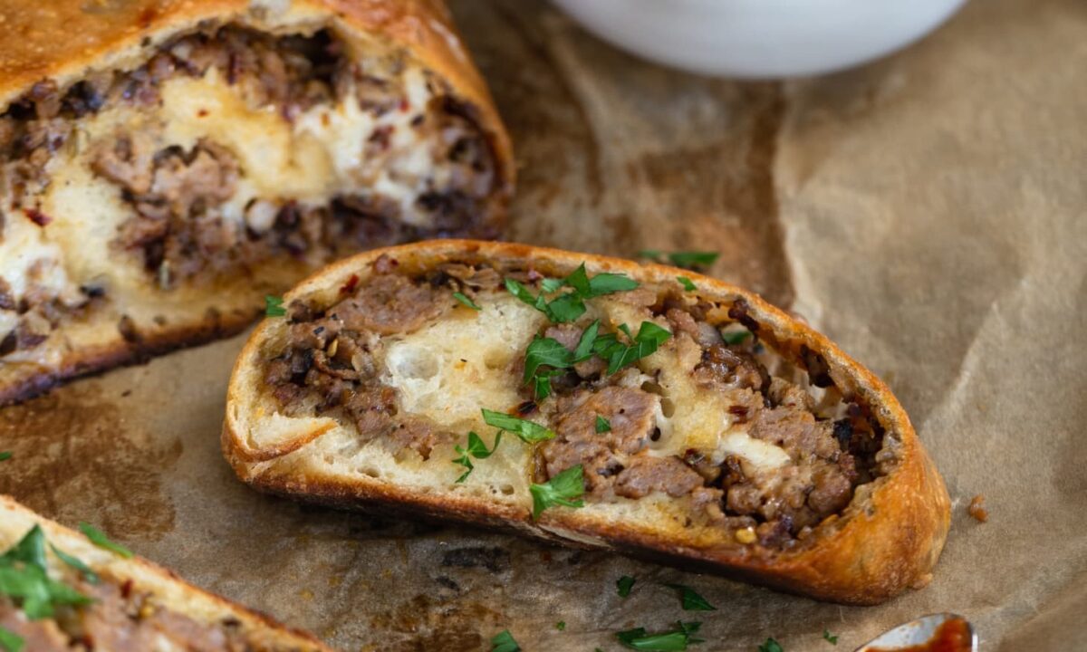 This hearty, homemade bread is made with ground sausage rolled in pizza dough. (Meleyna Nomura/TNS)