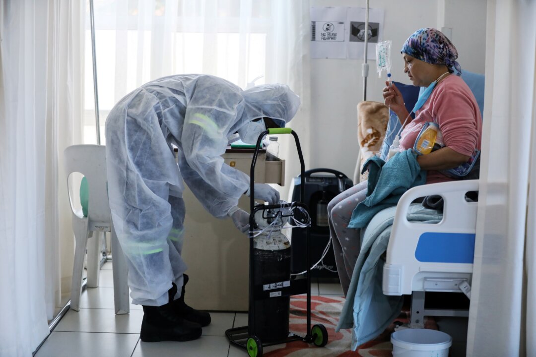 A patient is treated in a hospital in Johannesburg, South Africa, in a file photograph. (Sumaya Hisham/Reuters)