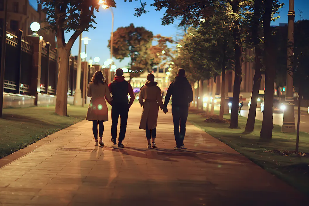 Taking a walk after dinner has an extra health benefit on the long nights of winter: it can keep you awake long enough for a healthy sleep. (Bee Bonnet/Shutterstock)