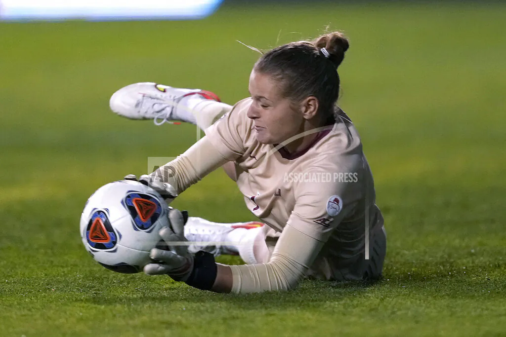 Florida State goalkeeper Cristina Roque (1) makes a save on a kick by BYU during the second half of the NCAA College Cup women's soccer final in Santa Clara, Calif., on Dec. 6, 2021. (Tony Avelar/AP Photo)