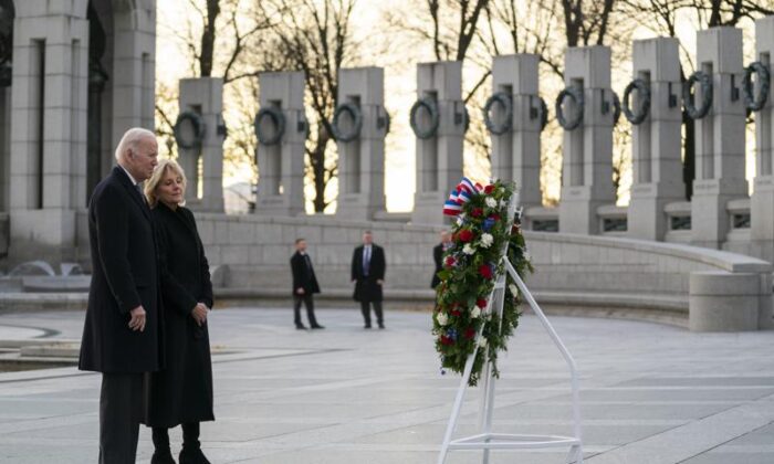 President Joe Biden and First Lady Jill Biden visit the National World War II Memorial to mark the 80th anniversary of the Japanese attack on Pearl Harbor, in Washington on Dec. 7, 2021. (Evan Vucci/AP Photo)