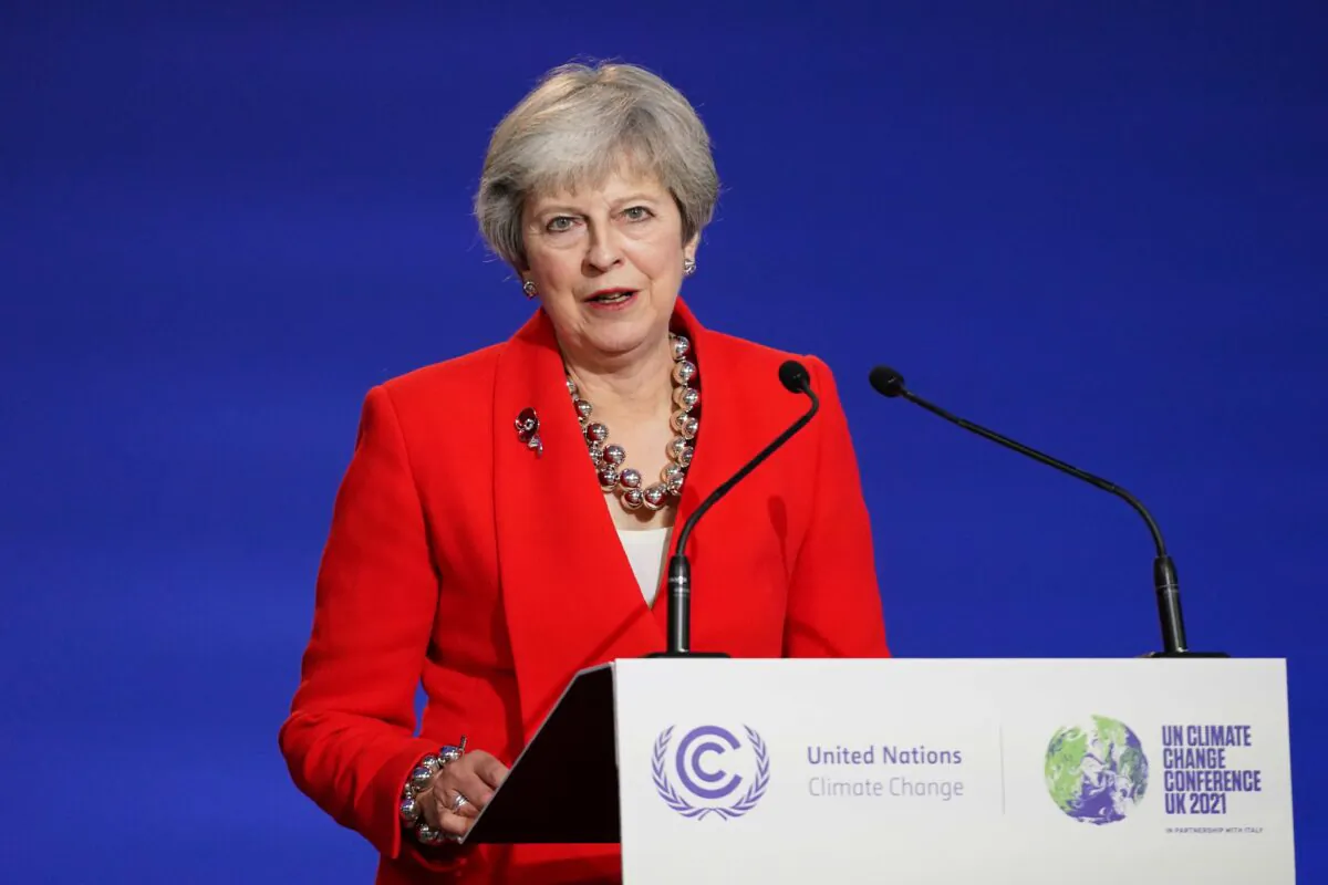 Theresa May speaks as ministers, businesses, and activists discuss rainforests on day seven of COP26 at SECC in Glasgow, Scotland, on Nov. 6, 2021. (Ian Forsyth/Getty Images)