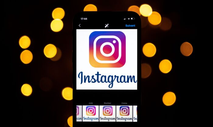 The logo of the social network Instagram is seen on a smartphone in Toulouse, France, on Sept. 28, 2020. (Lionel Bonaventure/AFP/Getty Images)
