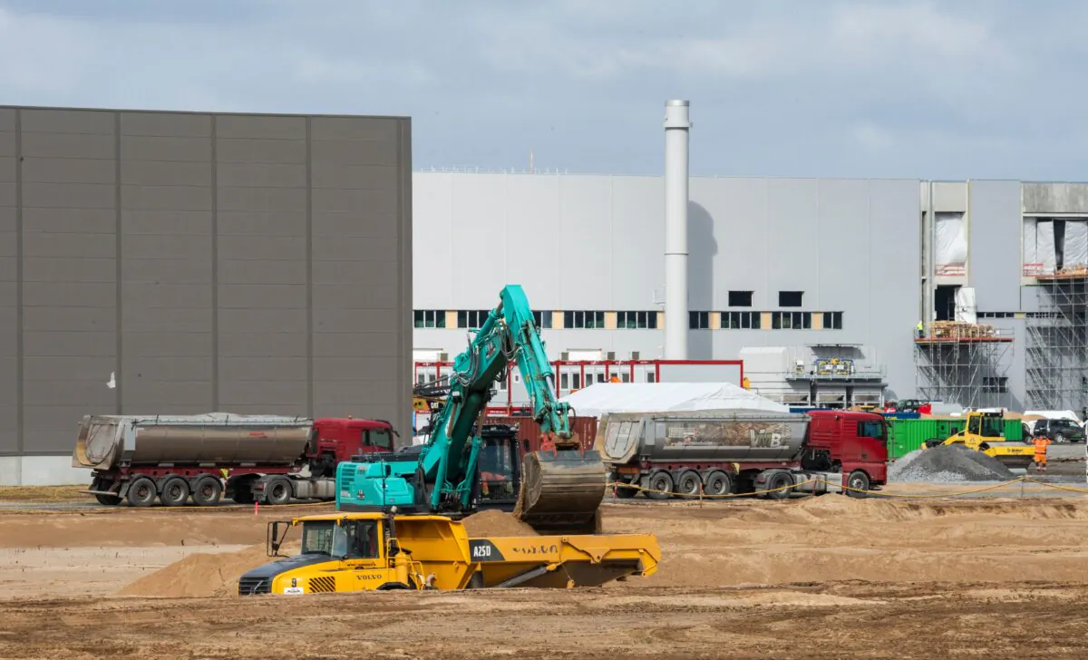 An excavator operates as work continues on Tesla's European "Gigafactory" in Gruenheide, near Berlin, on April 8, 2021. (John Macdougall/AFP via Getty Images)