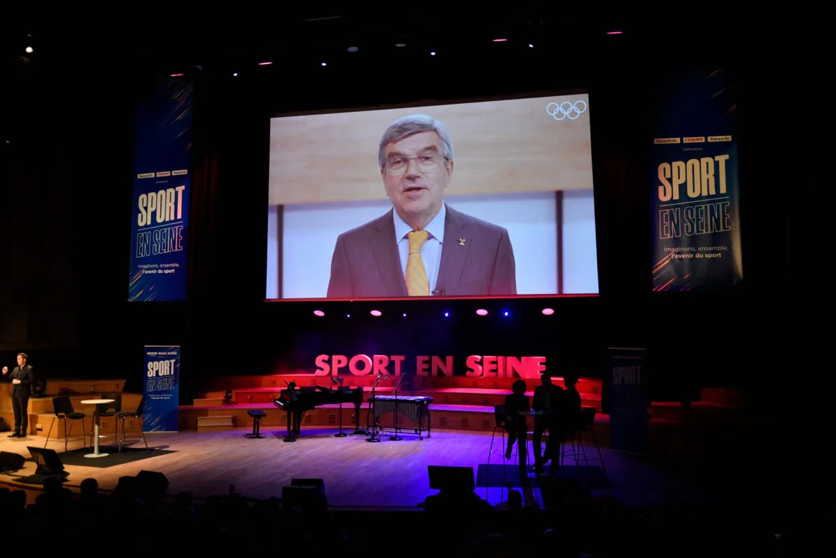President of the International Olympic Committee Thomas Bach attends via by video call the 1st edition of "Sport en Seine" Festival at La Maison de la Radio in Paris, on Oct. 28, 2021. (Julien De Rosa/AFP via Getty Images)
