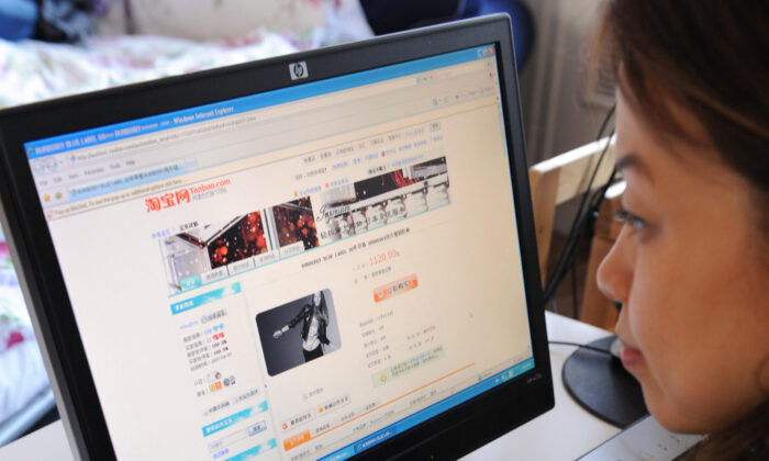 A woman in Beijing shops online at the Taobao website on Feb. 5, 2008. (Mark Ralston/AFP via Getty Images)