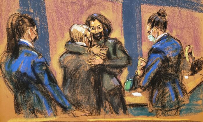 Ghislaine Maxwell hugs her lawyer Bobbi Sternheim during the trial of Maxwell, the Jeffrey Epstein associate accused of sex trafficking, in a courtroom sketch in New York City, N.Y., on Dec. 6, 2021. (Jane Rosenberg/Reuters)