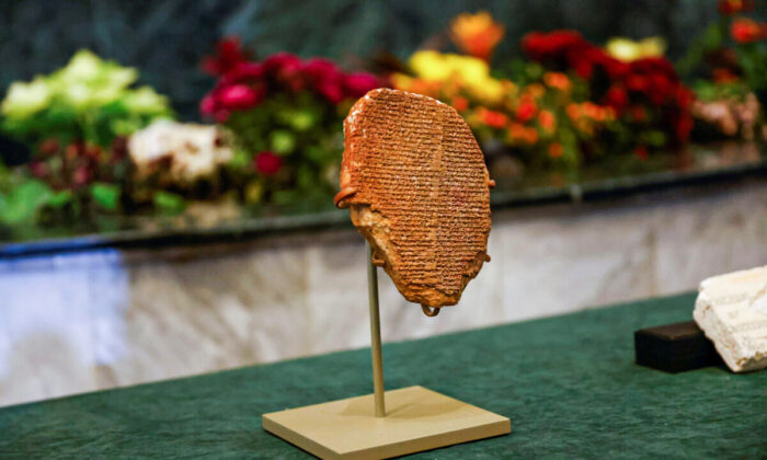 The Gilgamesh Dream Tablet returned to Iraq is displayed at the Ministry of Foreign Affairs in Baghdad, Iraq, on Dec. 7, 2021. (Saba Kareem/Reuters)