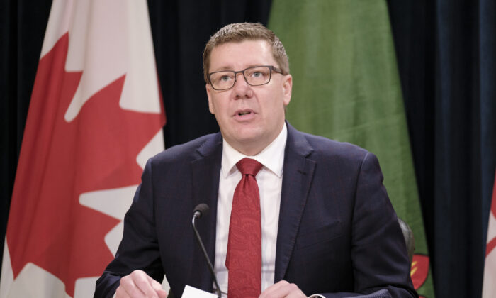 Saskatchewan Premier Scott Moe speaks at a press conference in Regina on Dec. 9, 2020. ( Canadian Press/Michael Bell)